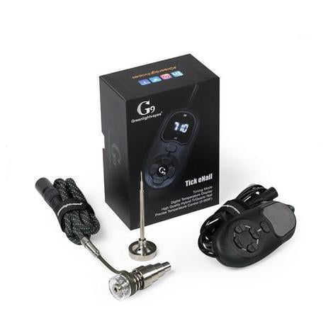 angled view of the G9 Tick E nail kit with all the parts inside the box on display. A Greenlightvapes product for those who want to upgrade to a professional dabbing setup.