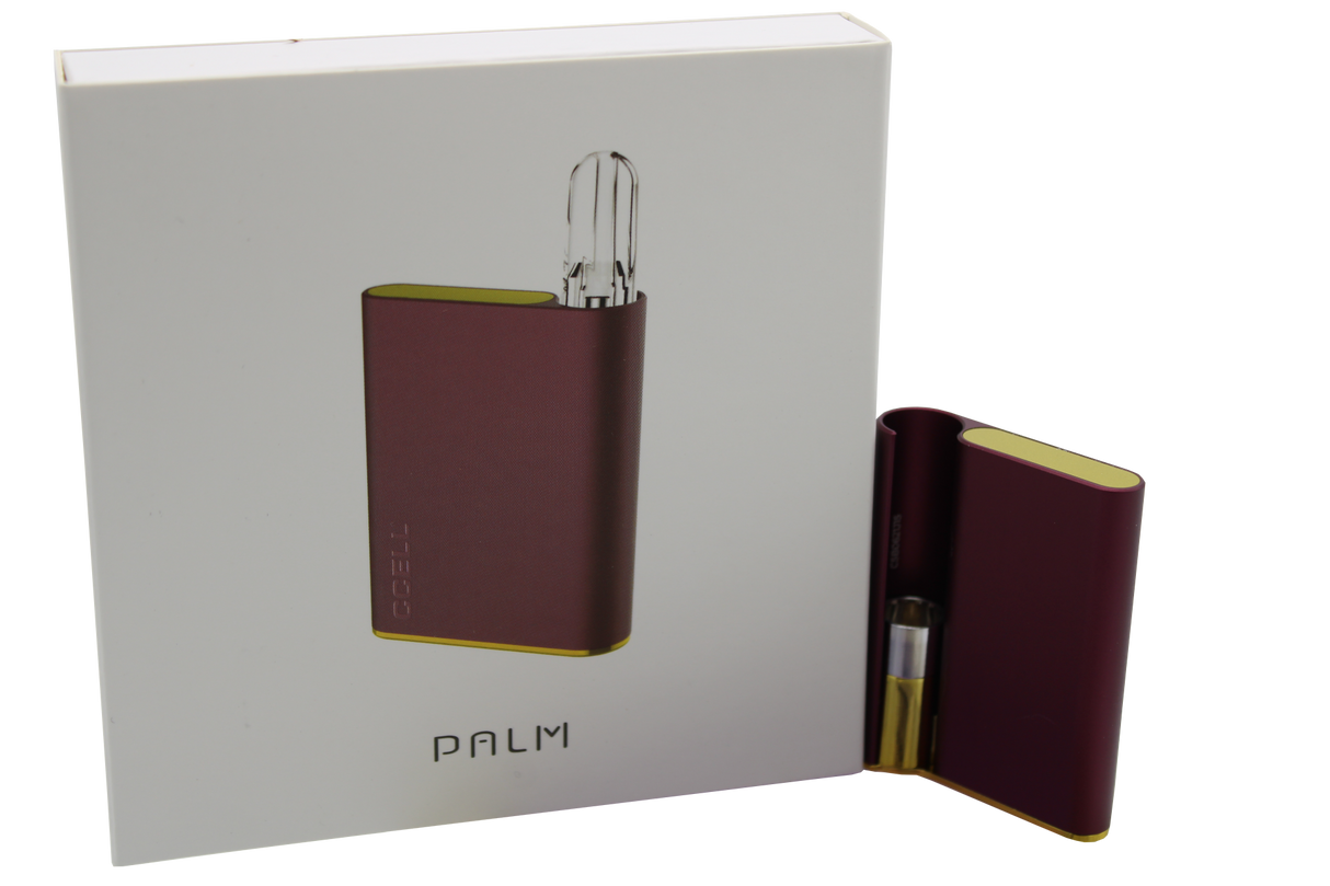 front view of the hamilton devices palm in a deep velvet red. a long lasting and premium feel vaporizer that fit in the palm for a lowkey experience on the go.