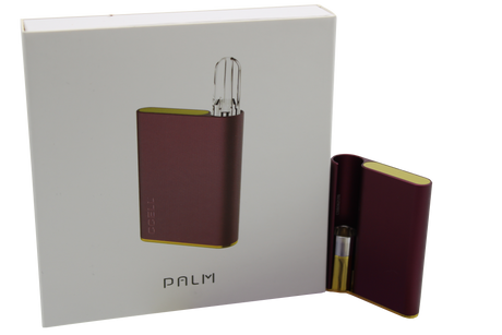 front view of the hamilton devices palm in a deep velvet red. a long lasting and premium feel vaporizer that fit in the palm for a lowkey experience on the go.