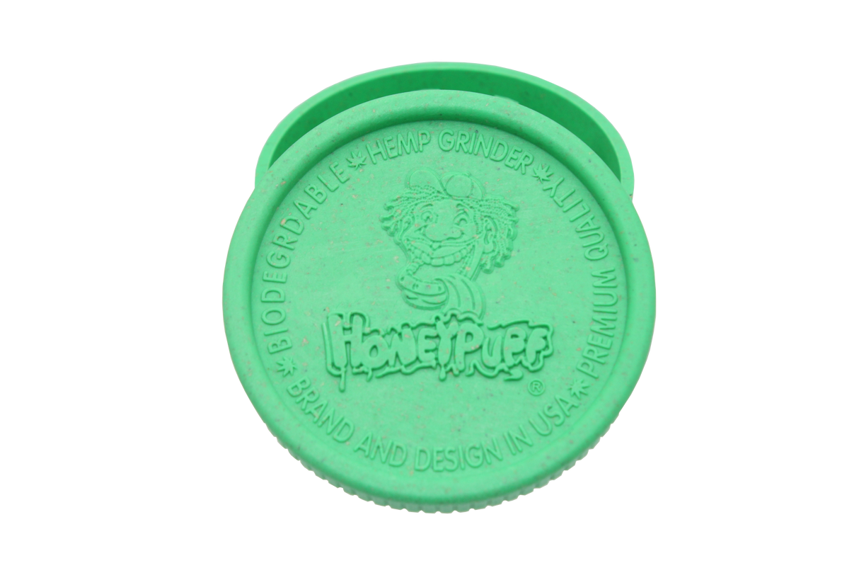 top view of the Honeypuff 56mm Biodegradable green hemp grinder. A eco friendly grinder that is durable while being compact for everyday use. 