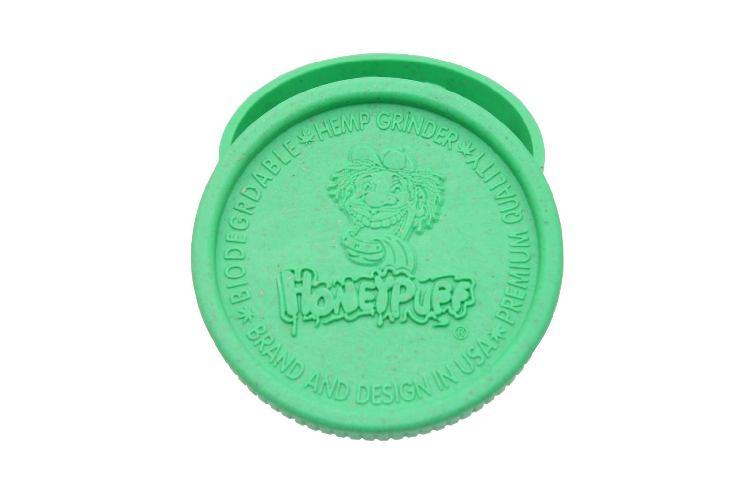 top view of the Honeypuff 56mm Biodegradable green hemp grinder. A eco friendly grinder that is durable while being compact for everyday use. 
