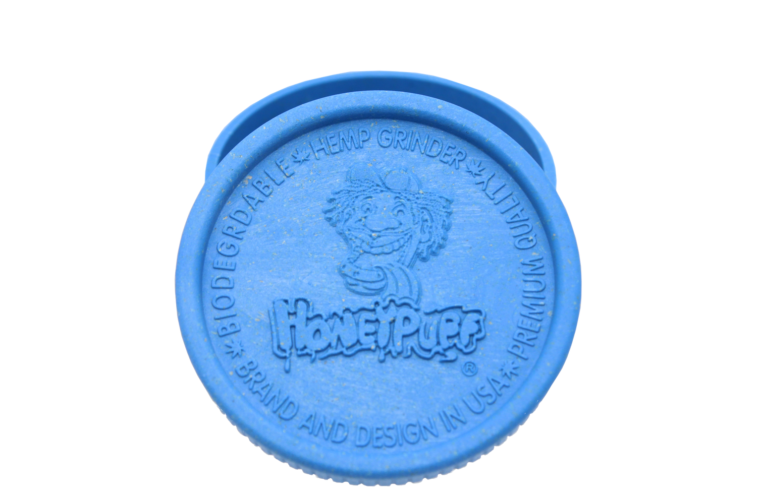 top view of the Honeypuff 56mm Biodegradable blue hemp grinder. A eco friendly grinder that is durable while being compact for everyday use. 