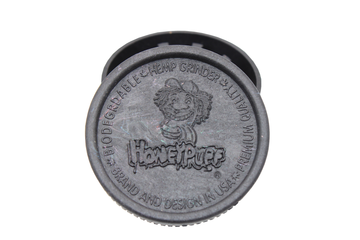 open view of the Honeypuff 56mm Biodegradable black hemp grinder. A eco friendly grinder that is durable while being compact for everyday use. 
