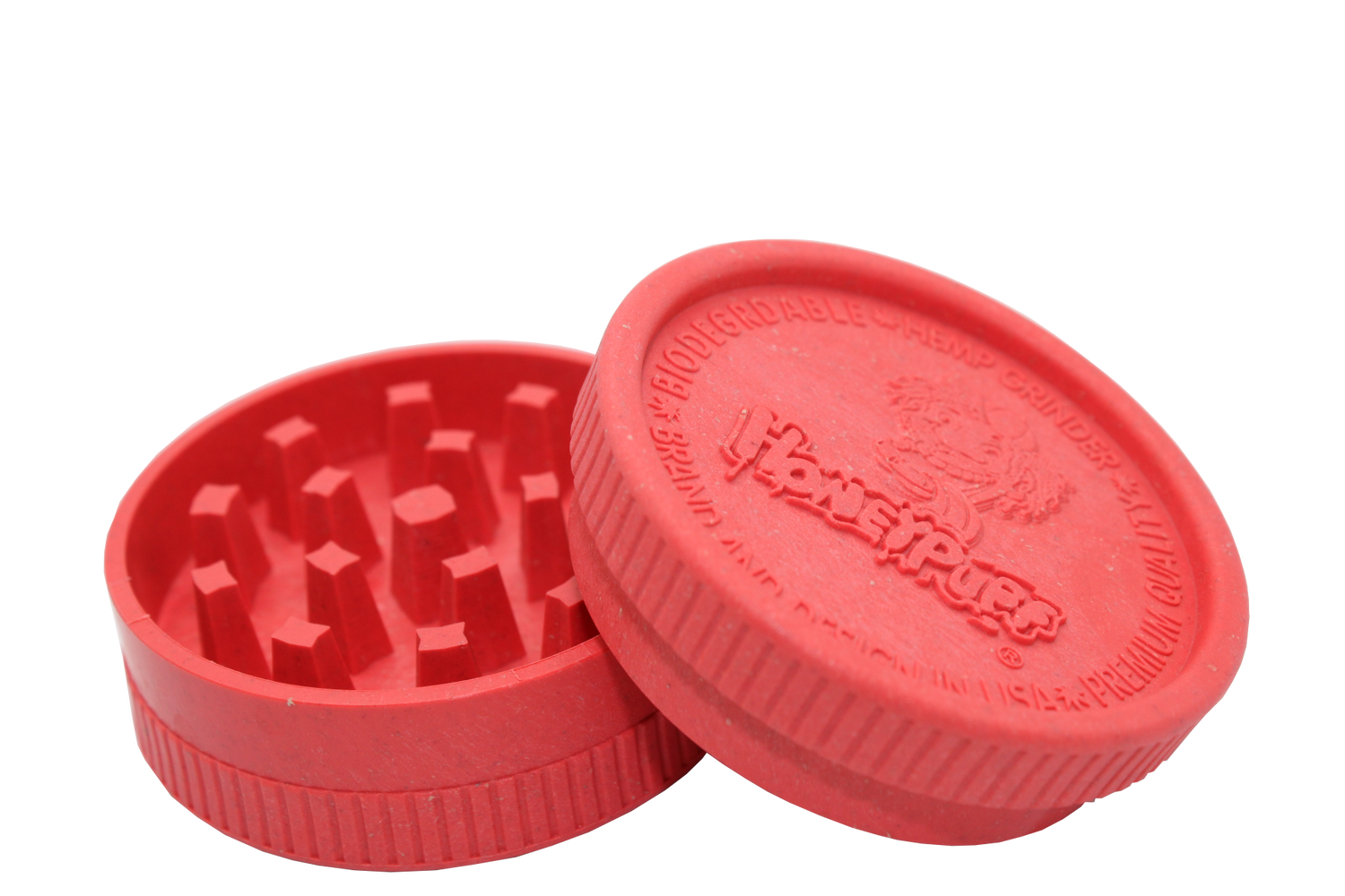 open side view of the Honeypuff 56mm Biodegradable red hemp grinder. A eco friendly grinder that is durable while being compact for everyday use. 
