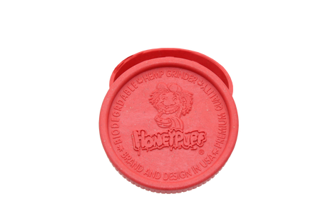 open top view of the Honeypuff 56mm Biodegradable red hemp grinder. A eco friendly grinder that is durable while being compact for everyday use. 