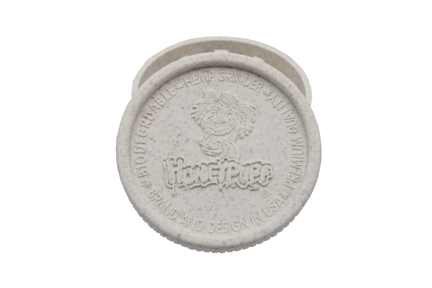 top view of the Honeypuff 56mm Biodegradable white hemp grinder. A eco friendly grinder that is durable while being compact for everyday use. 