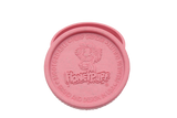 top view of the Honeypuff 56mm Biodegradable pink hemp grinder. A eco friendly grinder that is durable while being compact for everyday use. 