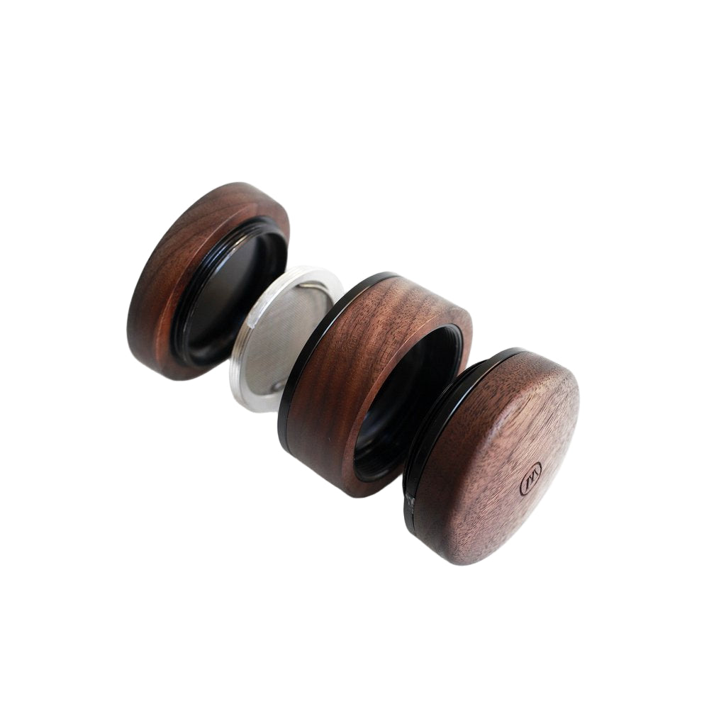 exploded view of the Marley Natural 4 piece small grinder. made from quality materials this grinder is elegantly made and precise. 