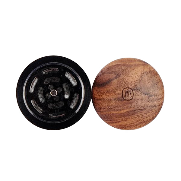top down image of the Marley natural 4 piece grinder showcasing the 1st and 2nd piece of the product. A quality grinder made of sustainable materials and attention to detail.