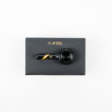 a top down view of the Smoked glass spoon pipe from Marley Natural. A premium smoking pipe made of smoked glass along with its premium feel case.