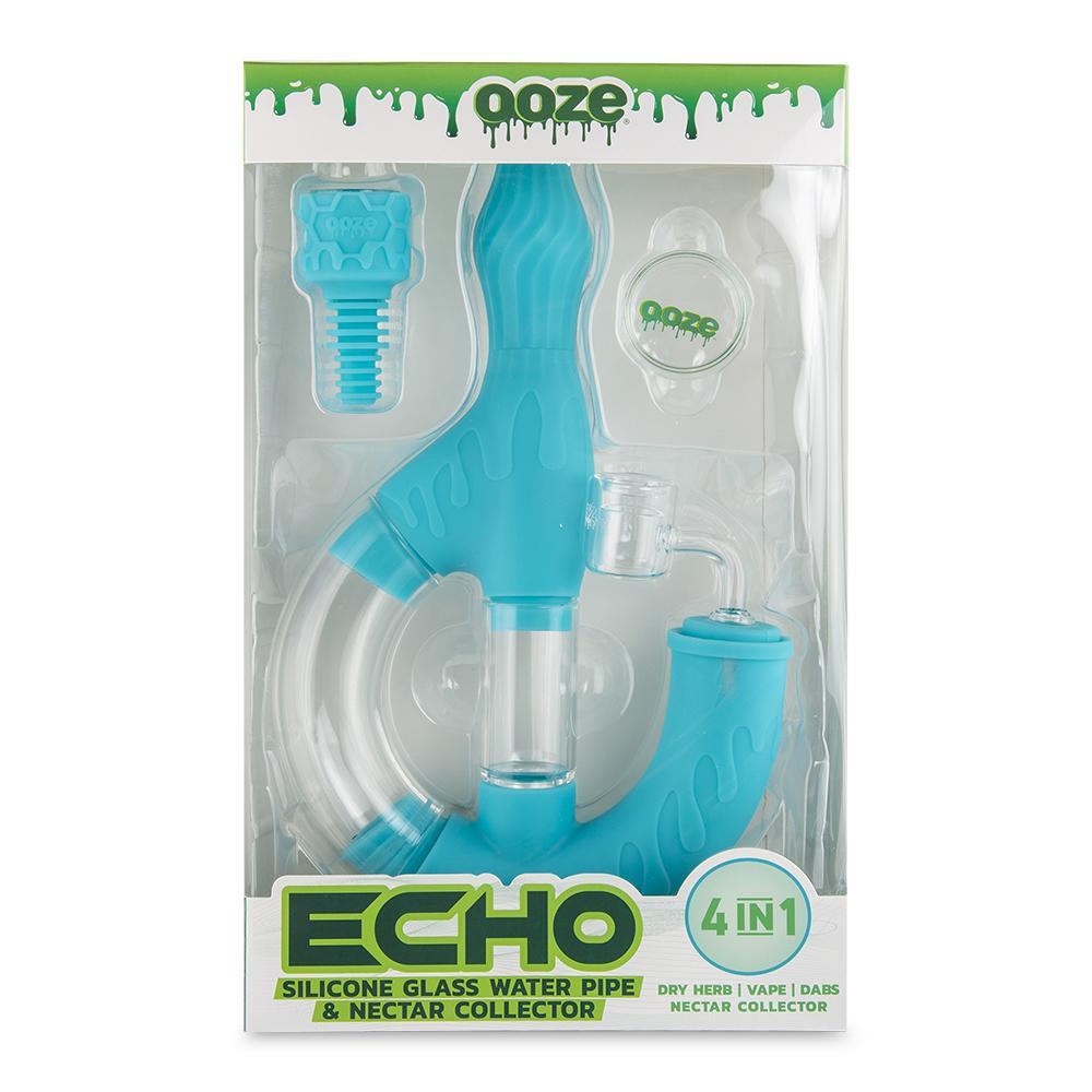 front view of the Ooze Echo silicone water pipe in its package. A multi use water pipe able to be used for multiple types of uses. made from durable silicone and high quality glass.