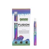 front view of the ooze fusion product and package in a titanium anodized finish. A product built for multiple concentrate experiences with three interchangeable coils for different flavor profiles.