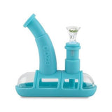 profile view of the ooze steamboat in blue, a durable water pipe for both concentrate and dry herb. A premium pipe with the clean flavorless glass with durable silicone.