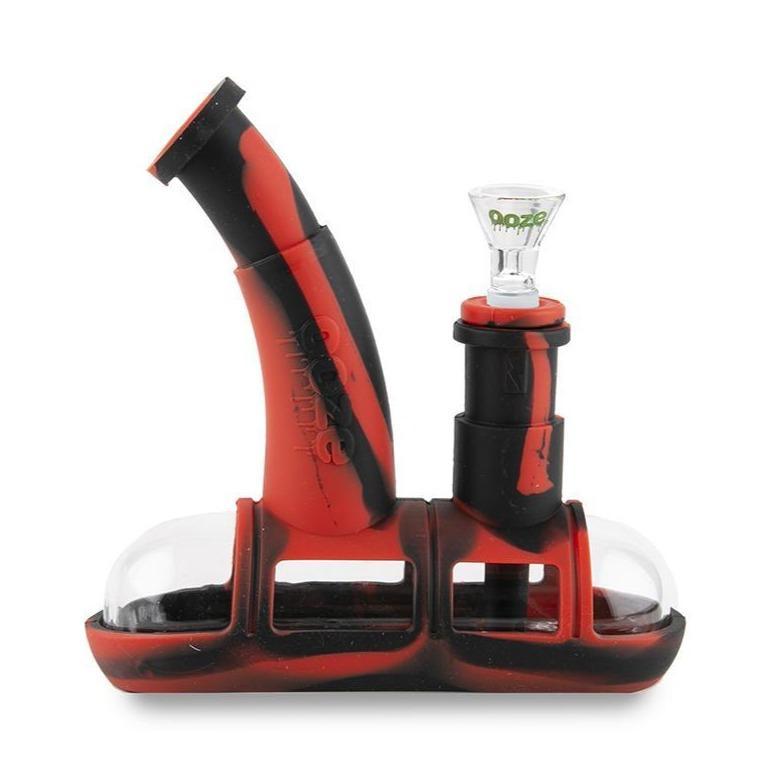 profile view of the ooze steamboat in red and black, a durable water pipe for both concentrate and dry herb. A popular item with universal compatibility.