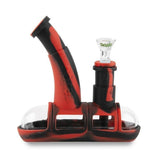 profile view of the ooze steamboat in red and black, a durable water pipe for both concentrate and dry herb. A popular item with universal compatibility.