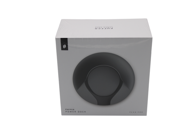 front view of the Puffco Peak Pro power dock. A wireless charging station for the peak pro allowing to give assurance for your device to not die mid session.