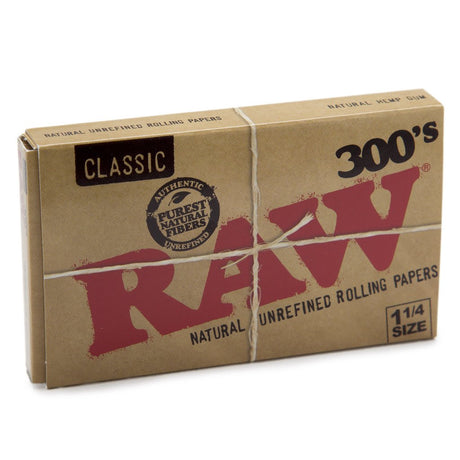 Front view of a RAW 300s Classic 1 1/4 pack. A unique RAW rolling paper product for smoking.