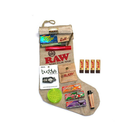 View of the RAW canvas stocking with many of the items that can fit in the stocking.