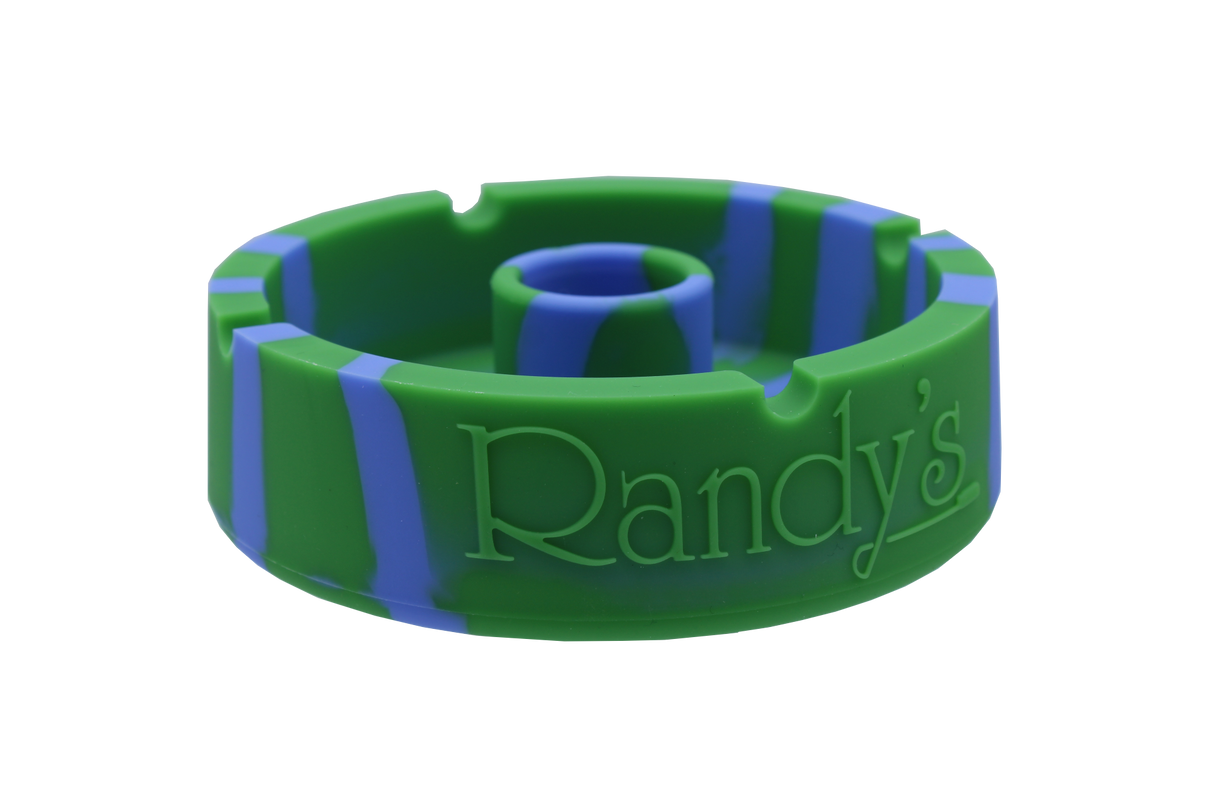 front view of the randy's 5" circle silicone ashtray. A durable ashtray with a circular bumper debowler. Casted in green and blue colors