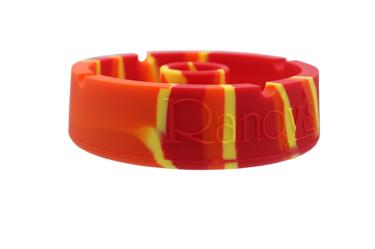 front view of the randy's 5" circle silicone ashtray. A durable ashtray with a circular bumper debowler. Casted in orange, red and yellow colors