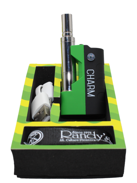 open box view of the Randy's Cham vaporizer made with a durable body, tactile feel, and open panel chassis, along with its charging cable with carrying lanyard.