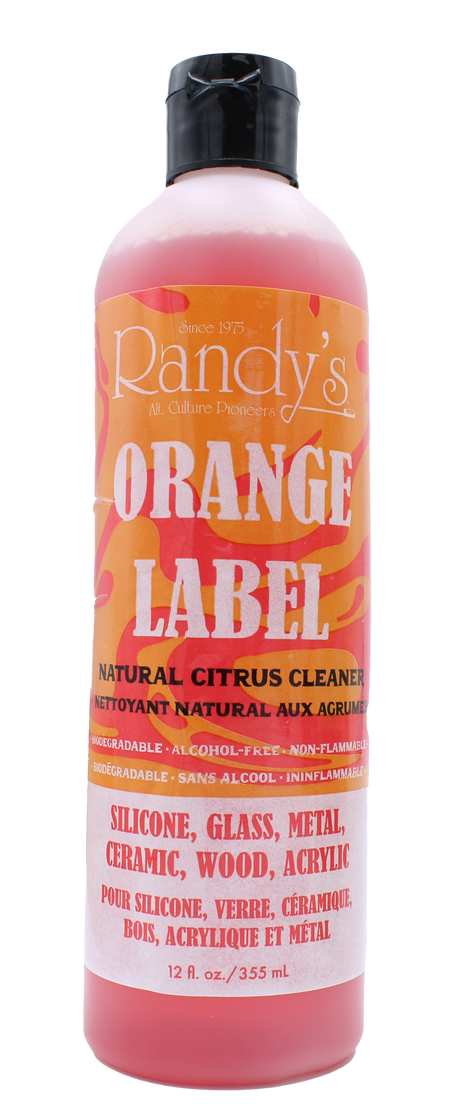 front view of the randy's orange label cleaner. made for silicone, glass, metal, ceramic, wood, and acrylic surfaces for a clean shiny finish for peak smoking experience.