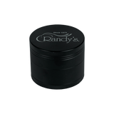 side view of the Randy's Revolution 4 piece grinder in black. a aluminum premium grinder with sharp teeth that will shred and fluff your herb consistently.