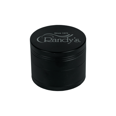 side view of the Randy's Revolution 4 piece grinder in black. a aluminum premium grinder with sharp teeth that will shred and fluff your herb consistently.