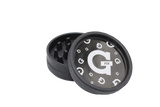 side view of the santa cruz shredder g pen collaboration grinder. made of hemp composites and patented teeth for flower shredding.