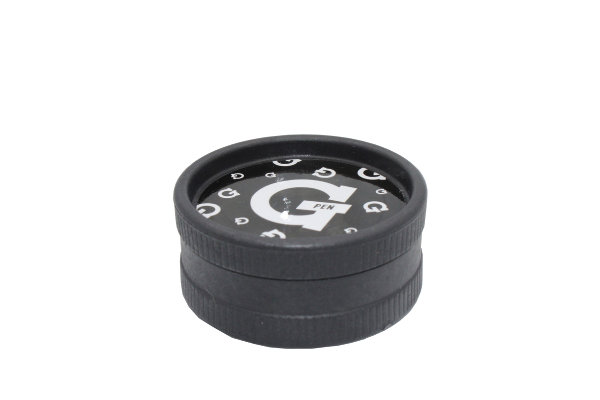 side view of the santa cruz shredder g pen collaboration grinder. made of hemp composites and patented teeth for quality flower shredding.
