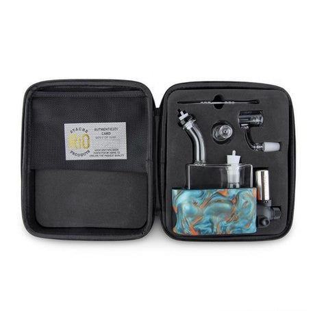 side profile view of the portable Stache Products RiO and carrying case in marble blue orange. made for a portable and consistent dabbing experience every time.