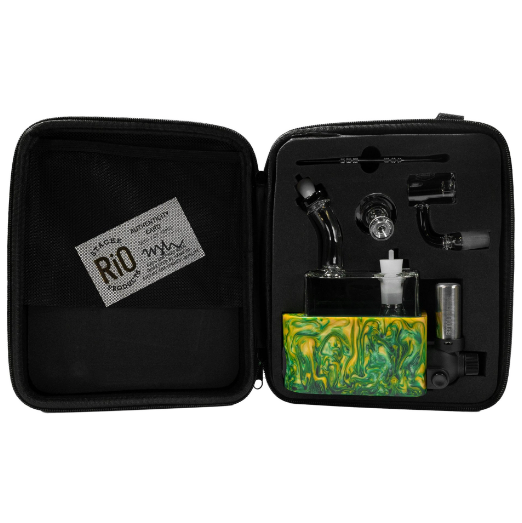 side profile view of the portable Stache Products RiO and carrying case in marble green yellow. made for a portable and consistent dabbing experience every time.