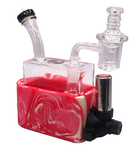 angled view of the portable Stache Products RiO in a marble red white. made for dabbing connoisseurs who want the portability and performance of a desktop glass rig.