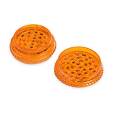 opened view of the Storz & Bickel herb mill. showcasing the pyramid shaped teeth for a consistent and airy herb grind.