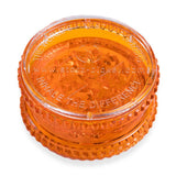 front angle view of the Storz & Bickel Herb Mill. A meticulously engineered product to efficiently grind herb into a airy and fluffy product for smoking.