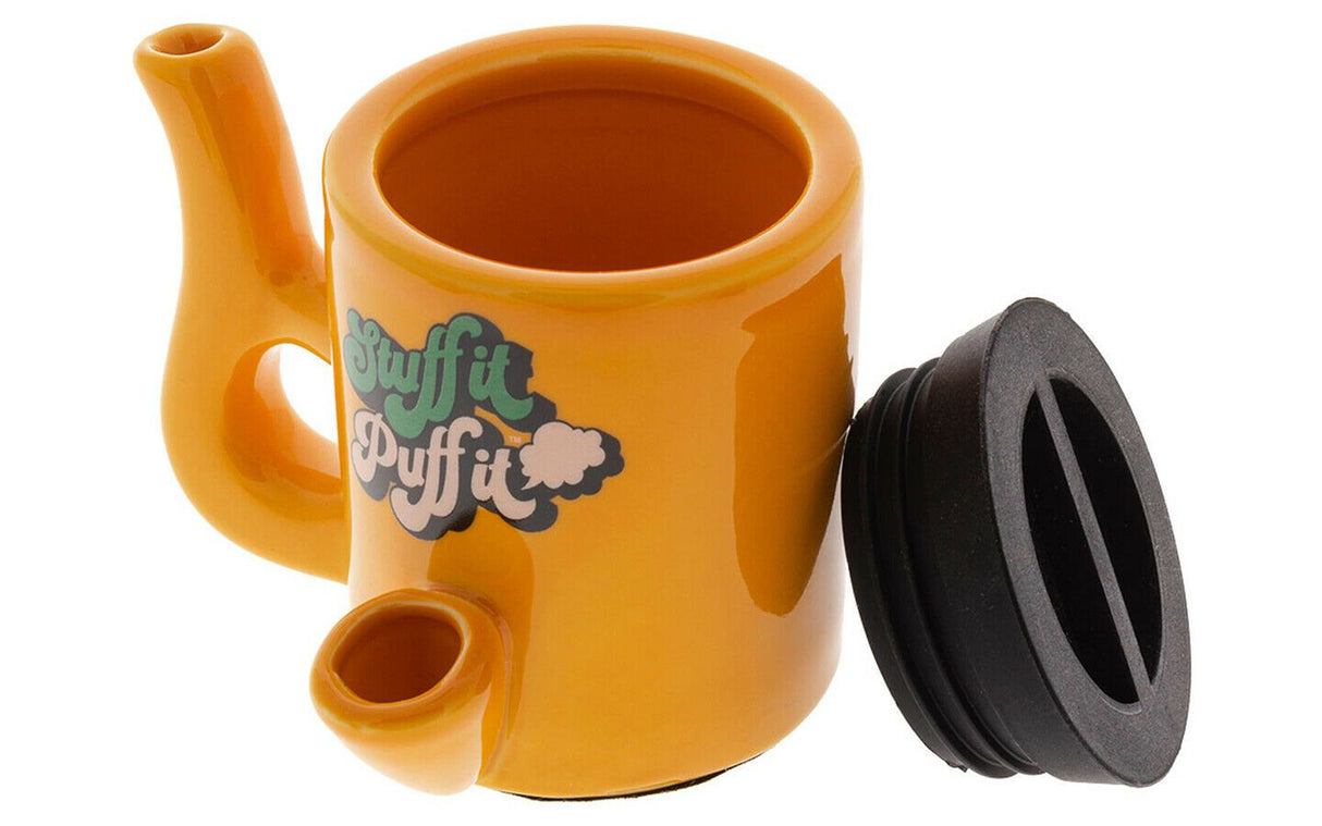 front view of the stuff it puff it mug in orange. A multi use mug with pipe and stash jar for storage.