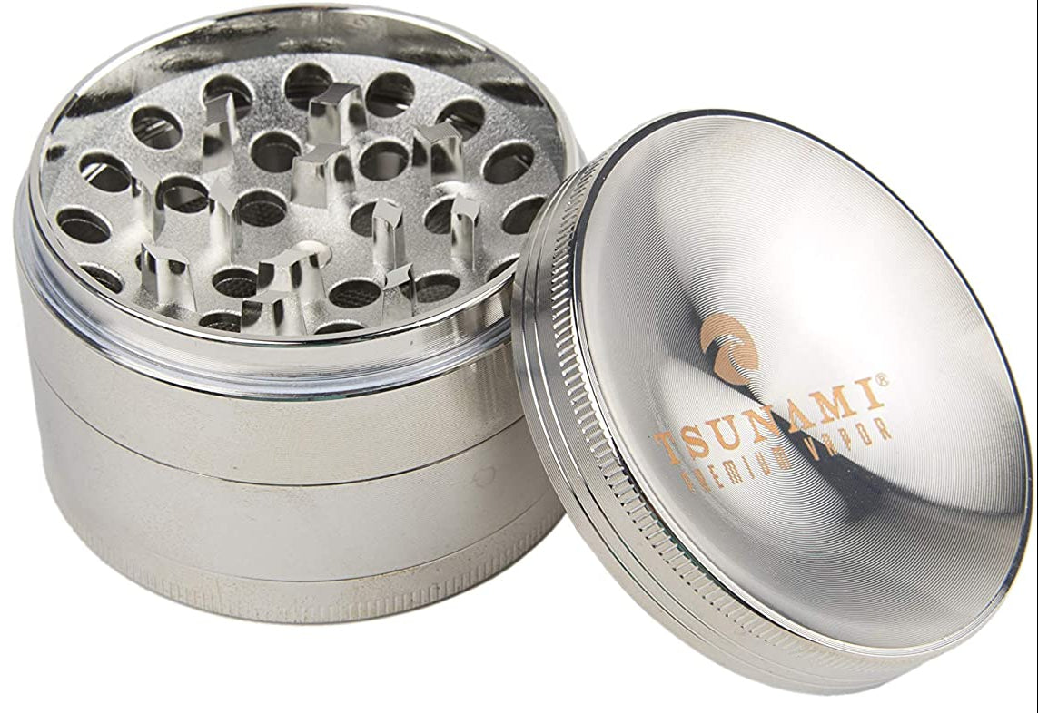 opened view of the Tsunami 63mm grinder with its proprietary shaped teeth for a improved grinding experience.