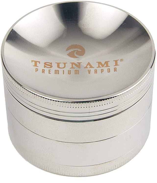 front view of theTsunami 63mm grinder in a polished silver. a Precise and high quality product with strong grinding teeth made out of air craft grade aluminum.