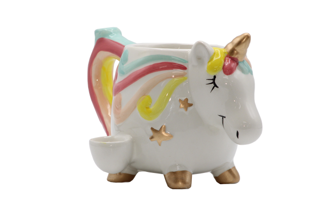 side view of the ceramic mug with built in hand pipe. Made with a unicorn design.