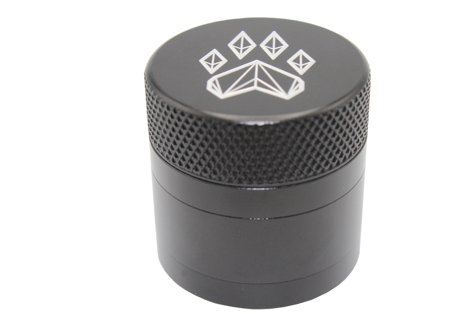 side close up view of the Wolf grinder 1.5" 4 piece grinder. Made of lightweight and durable aluminum. it is precisely made that provides a consistent shred with its sharp teeth while being portable. I ti made in a durable anodized black coloring.