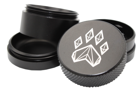exploded view of the Wolf grinder 1.5" 4 piece grinder. Made of lightweight and durable aluminum. it is precisely made that provides a consistent shred with its sharp teeth while being portable. I ti made in a durable anodized black coloring.
