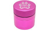 side close up view of the Wolf grinder 1.5" 4 piece grinder. Made of lightweight and durable aluminum. it is precisely made that provides a consistent shred with its sharp teeth while being portable. I ti made in a durable anodized pink coloring.