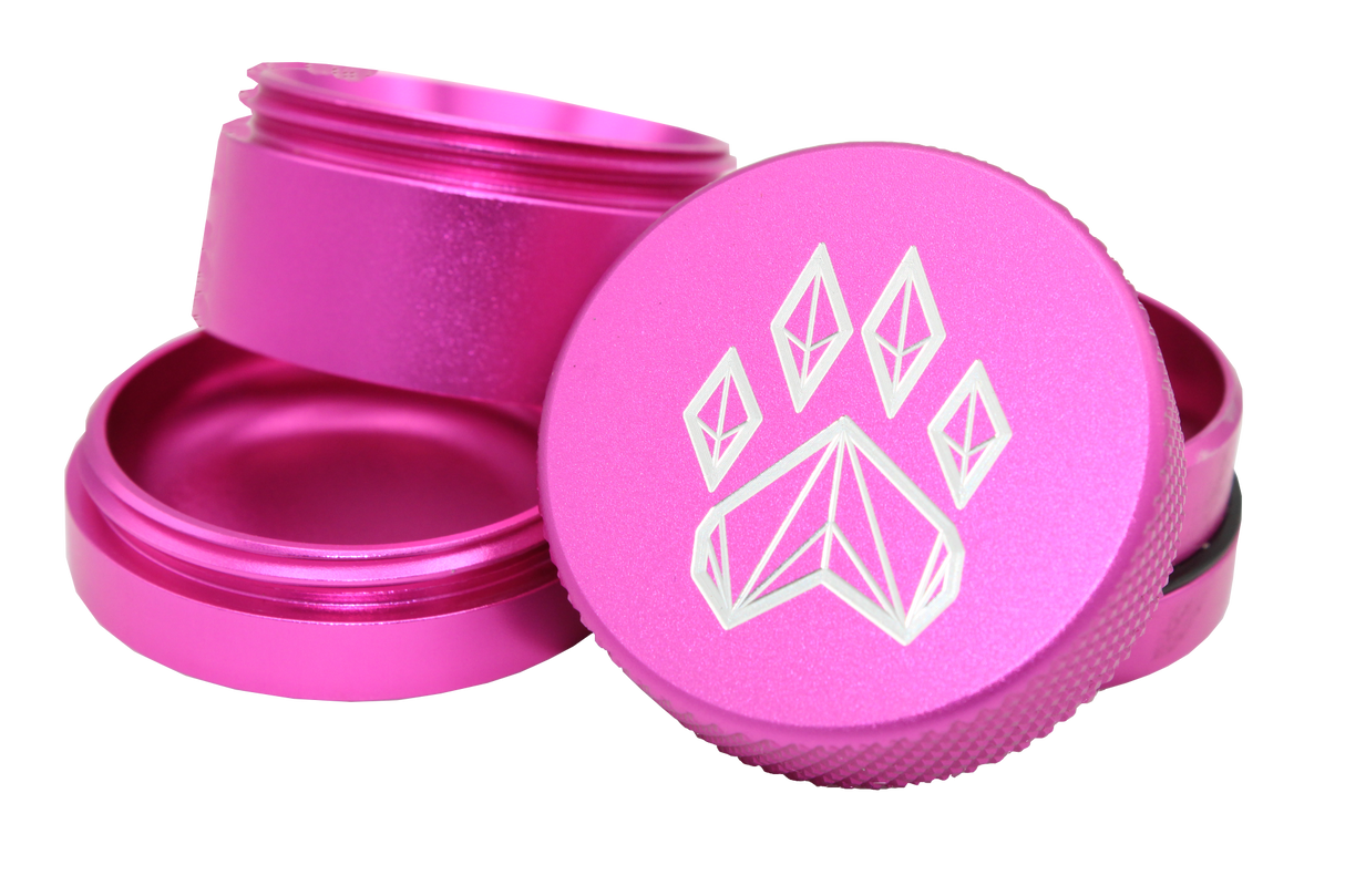 exploded view of the Wolf grinder 1.5" 4 piece grinder. Made of lightweight and durable aluminum. it is precisely made that provides a consistent shred with its sharp teeth while being portable. I ti made in a durable anodized pink coloring.