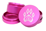 exploded view of the Wolf grinder 1.5" 4 piece grinder. Made of lightweight and durable aluminum. it is precisely made that provides a consistent shred with its sharp teeth while being portable. I ti made in a durable anodized pink coloring.