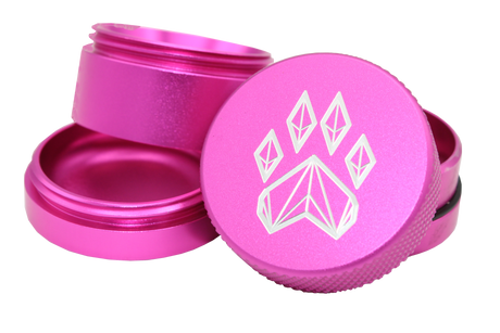 exploded view of the Wolf grinder 1.5" 4 piece grinder. Made of lightweight and durable aluminum. it is precisely made that provides a consistent shred with its sharp teeth while being portable. I ti made in a durable anodized pink coloring.
