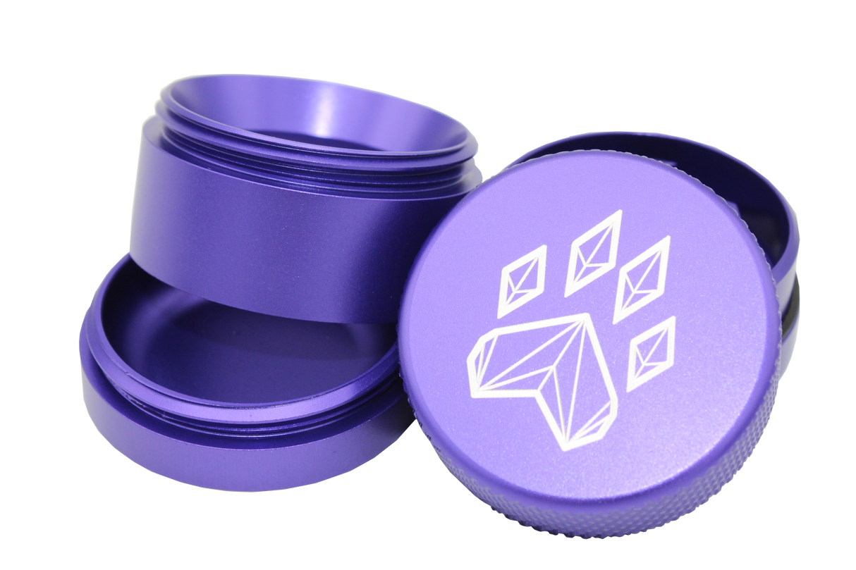 exploded view of the Wolf grinder 1.5" 4 piece grinder. Made of lightweight and durable aluminum. it is precisely made that provides a consistent shred with its sharp teeth while being portable. I ti made in a durable anodized purple coloring.