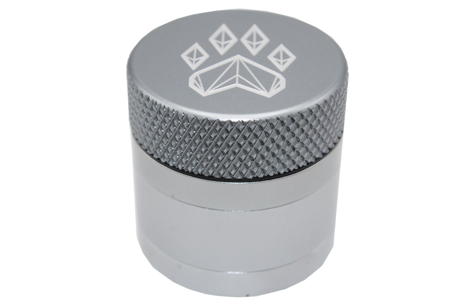 side close up view of the Wolf grinder 1.5" 4 piece grinder. Made of lightweight and durable aluminum. it is precisely made that provides a consistent shred with its sharp teeth while being portable. I ti made in a durable anodized silver coloring.