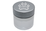 side close up view of the Wolf grinder 1.5" 4 piece grinder. Made of lightweight and durable aluminum. it is precisely made that provides a consistent shred with its sharp teeth while being portable. I ti made in a durable anodized silver coloring.