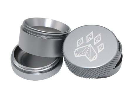 exploded view of the Wolf grinder 1.5" 4 piece grinder. Made of lightweight and durable aluminum. it is precisely made that provides a consistent shred with its sharp teeth while being portable. I ti made in a durable anodized silver coloring.