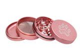 exploded view of the wolf grinders 2.5" 4 piece metal grinder. made of durable aluminum construction and anodized pink finish for a premium feel.